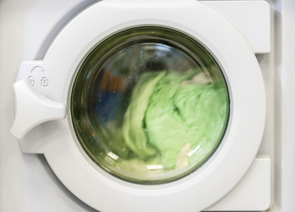 spinning laundry in washing machine 2